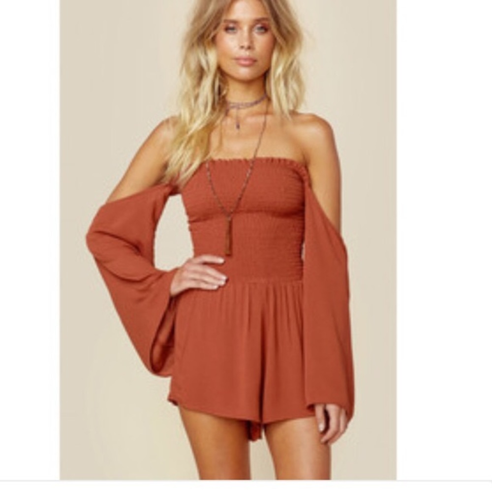 Burnt orange romper from princess Polly